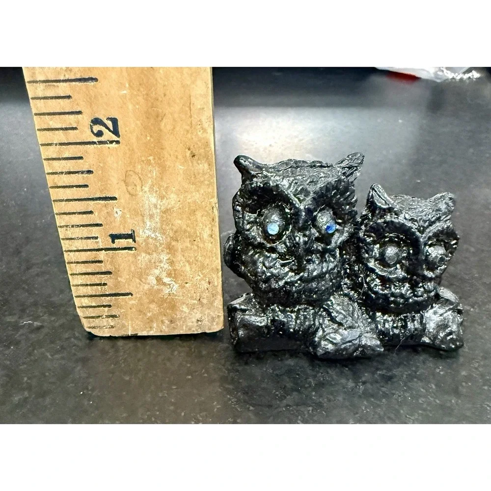 A Pair of Owls with Red Rhinestone Eyes Hand Crafted from Coal